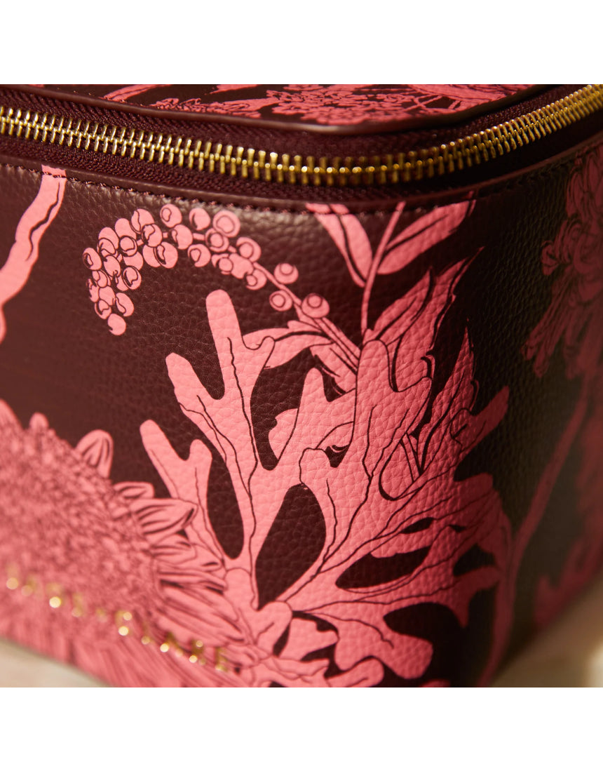 Sage x Clare Delphine Small Vanity Case in Garnet, a stylish cosmetic and toiletry bag with a vibrant red color.