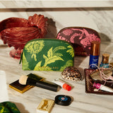 Sage x Clare Delphine Anise cosmetic pouch with floral pattern, fabric exterior, zipper closure, and spacious interior for toiletries.