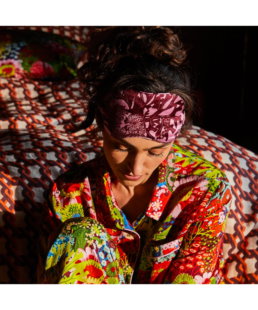 Sage x Clare Delphine Silk Eye Mask in orchid color, soft and luxurious with floral pattern for comfortable sleep.