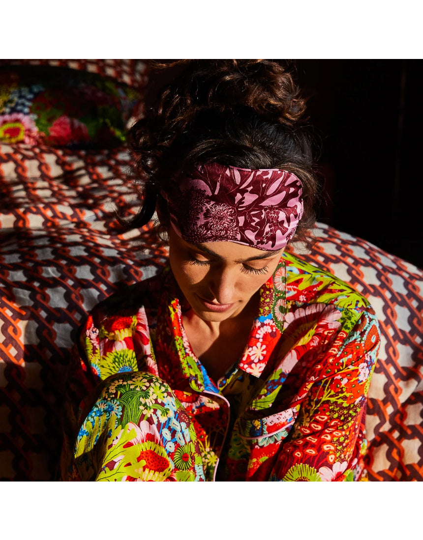 Sage x Clare Delphine Silk Eye Mask in orchid color, soft and luxurious with floral pattern for comfortable sleep.