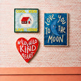 Colorful Jones & Co Fun House Tile wall art featuring playful cartoon characters for kids' room decor.