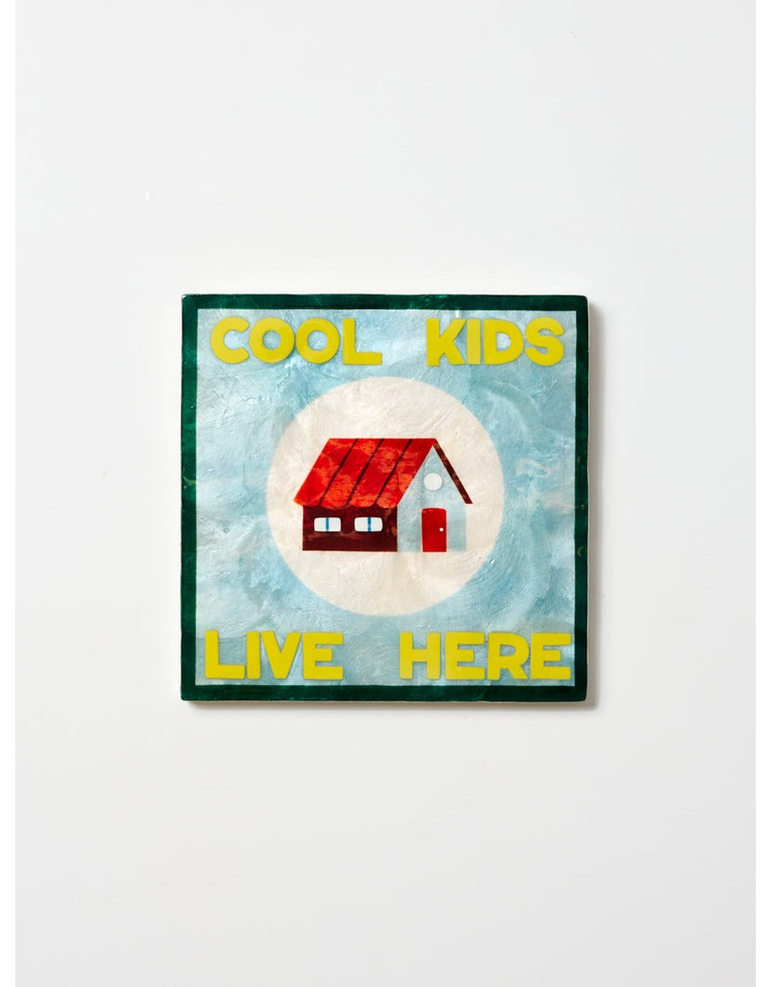 Colorful wall art tile from Jones & Co featuring a fun house design, perfect for kids' room decor.