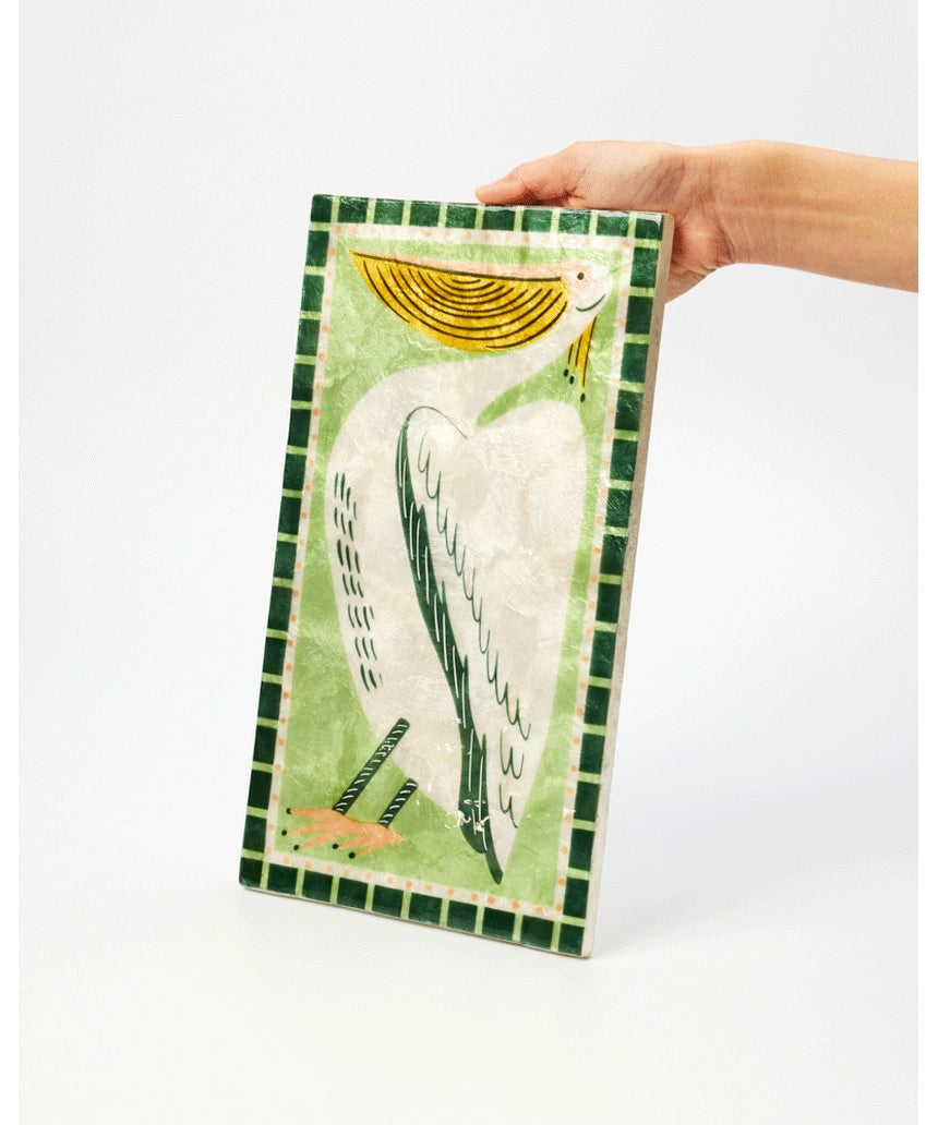 Jones & Co Mariner Wall Art featuring a detailed pelican illustration on a nautical-themed print.