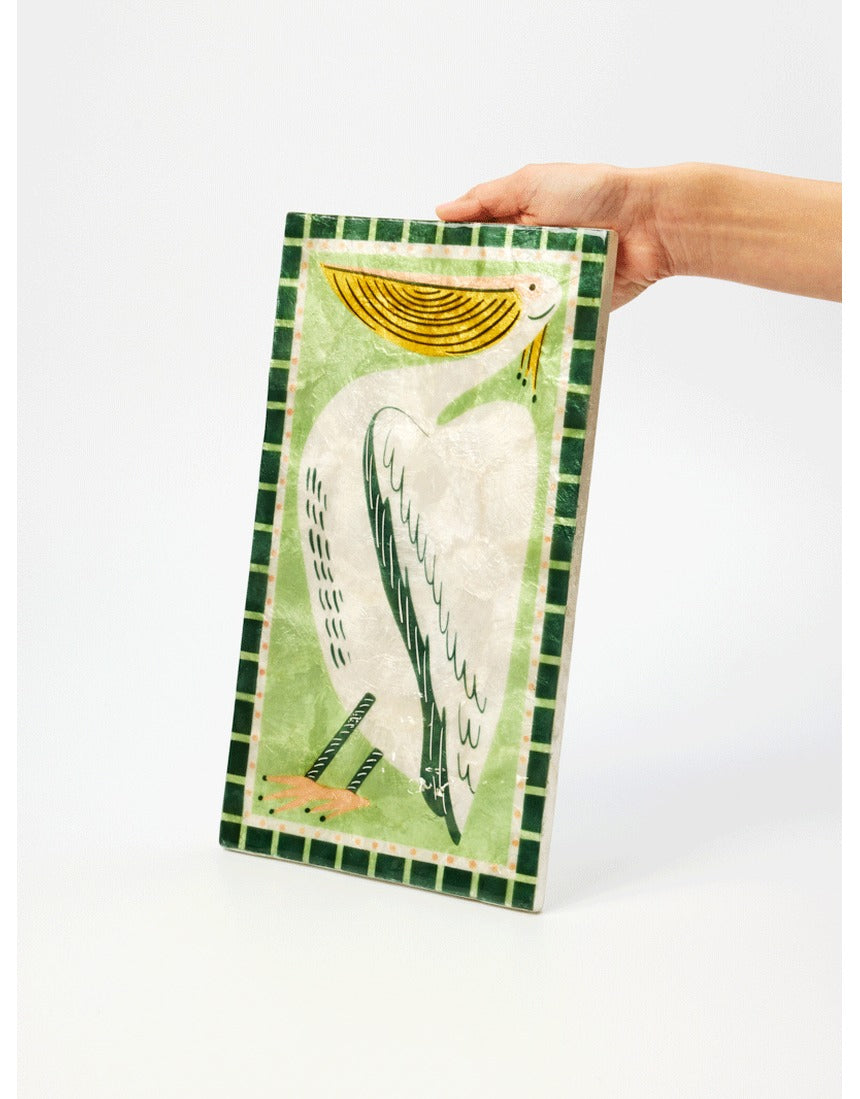 Jones & Co Mariner Wall Art featuring a detailed pelican illustration on a nautical-themed print.