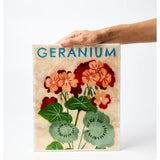 Jones & Co Market Wall Art featuring vibrant geranium floral design on textured background, perfect for home decor.