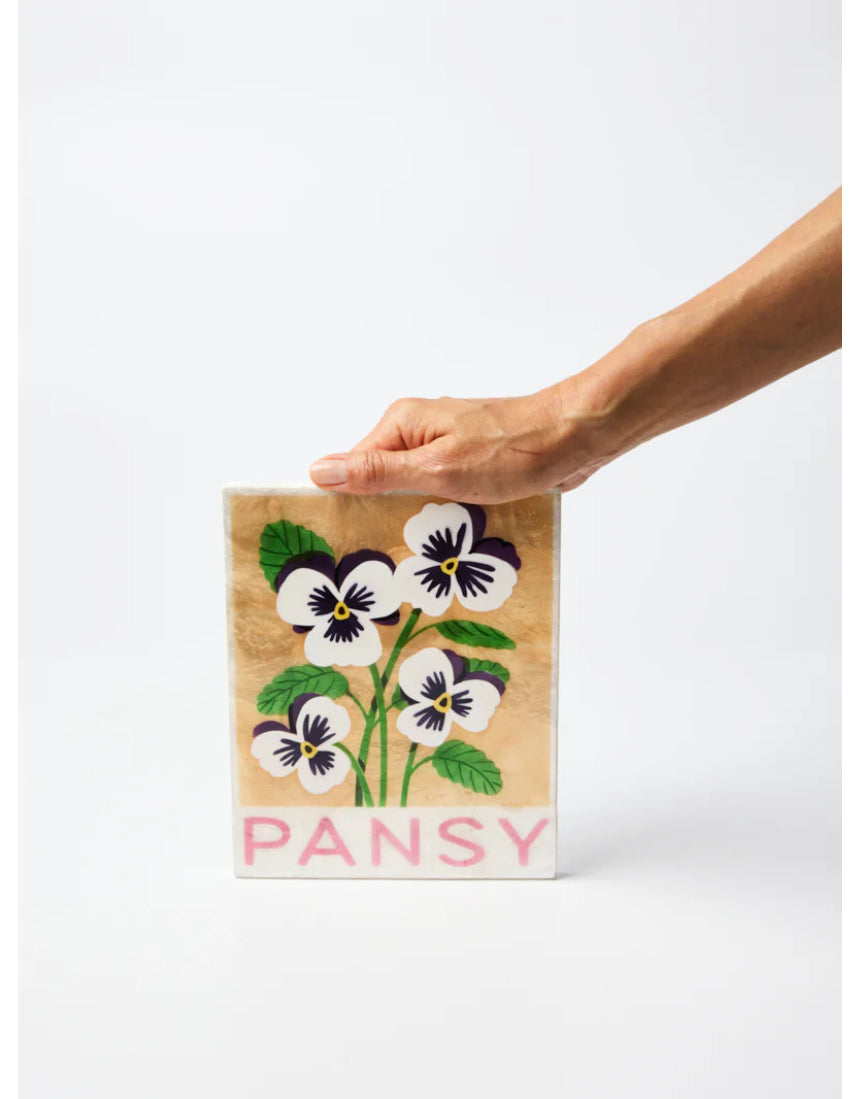 Jones & Co market wall art featuring a vibrant pansy flower with detailed botanical illustration on a neutral background.