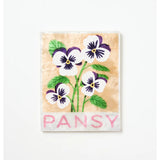 Jones & Co Market Wall Art featuring a vibrant pansy flower with detailed botanical illustration on a decorative wall art print.