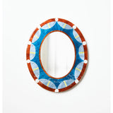 Jones & Co Paloma Mirror showing a sleek, modern design with a round shape and reflective glass surface.