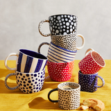 Jones & Co Chino Espresso Cup in black with a stylish spot design, perfect for serving espresso in a modern coffee setting.