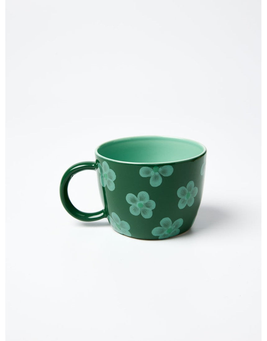Jones & Co Daisy Green Chino Mug with floral pattern, ceramic cup featuring green and white design.