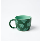 Jones & Co Daisy Green Chino Mug with floral pattern, ceramic cup featuring green and white design.