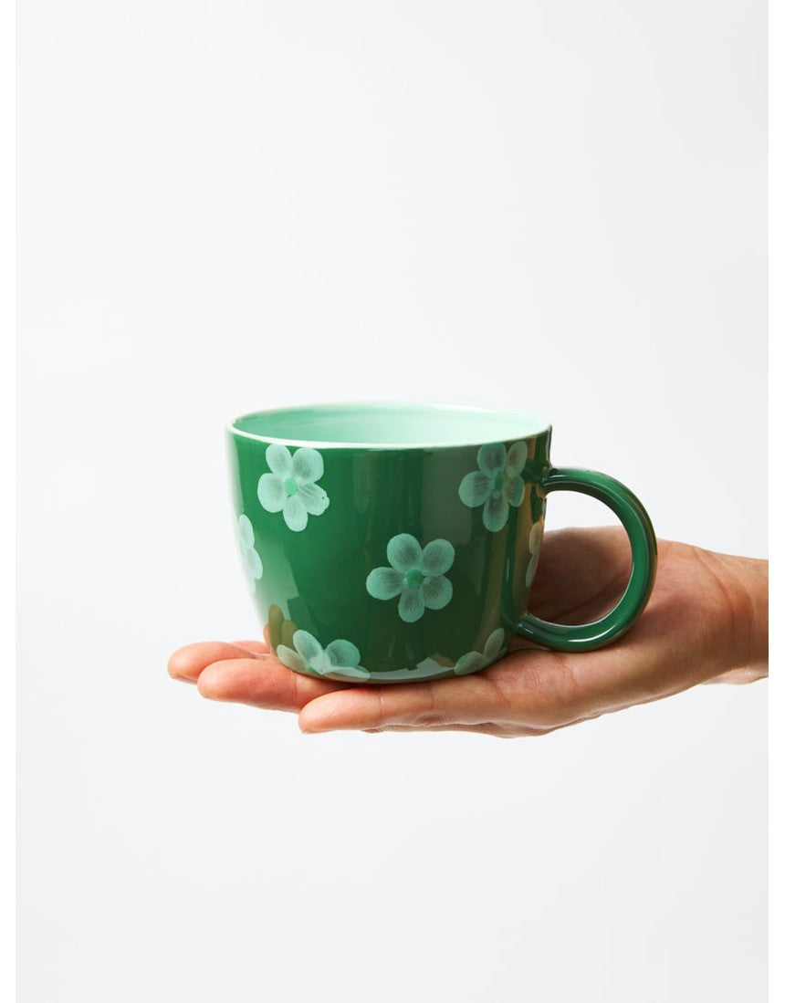 Jones & Co Chino Mug in Daisy Green with floral pattern, ceramic mug for hot beverages.