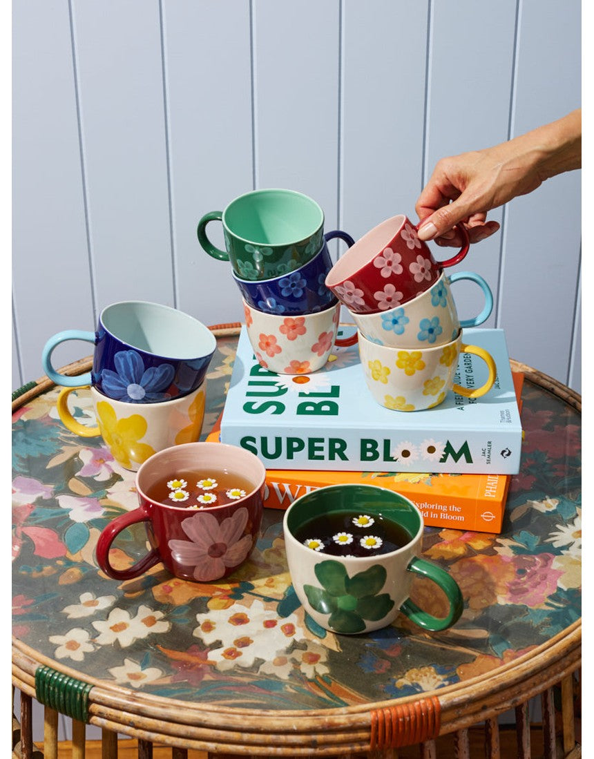 Jones & Co Chino Mug in Daisy Green featuring a stylish ceramic mug with a floral design and vibrant green color.