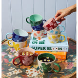 Jones & Co Chino Mug in Daisy Green featuring a stylish ceramic mug with a floral design and vibrant green color.