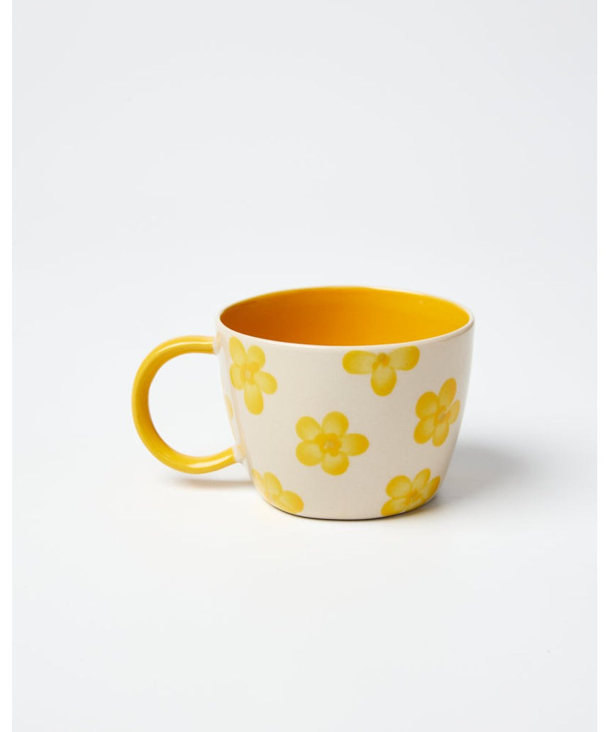 Jones & Co Daisy Mustard Chino Mug with floral design, ceramic coffee mug for hot beverages.