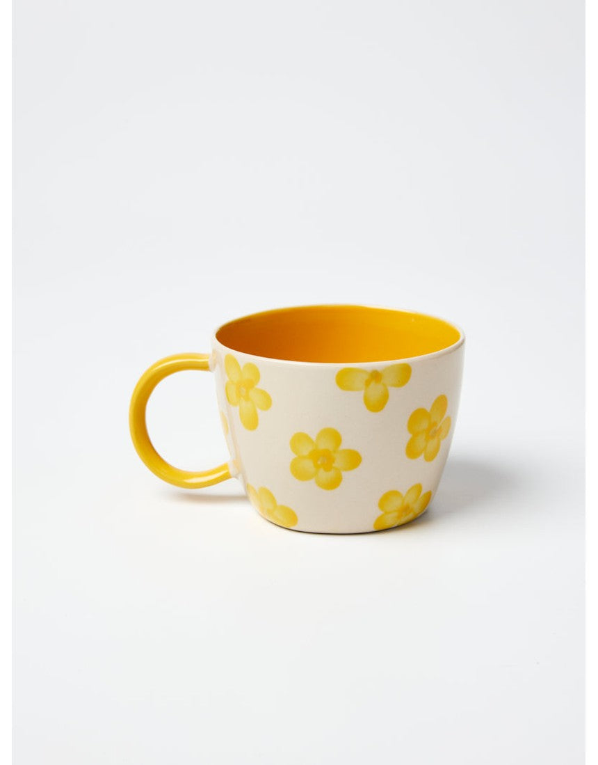 Jones & Co Daisy Mustard Chino Mug with floral design, ceramic coffee mug for hot beverages.
