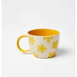 Jones & Co Daisy Mustard Chino Mug with floral design, ceramic coffee mug for hot beverages.