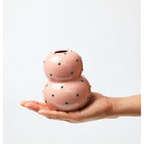 Jones & Co Fonda Vase in pink and green with a playful dotty pattern, showcasing a stylish ceramic design.