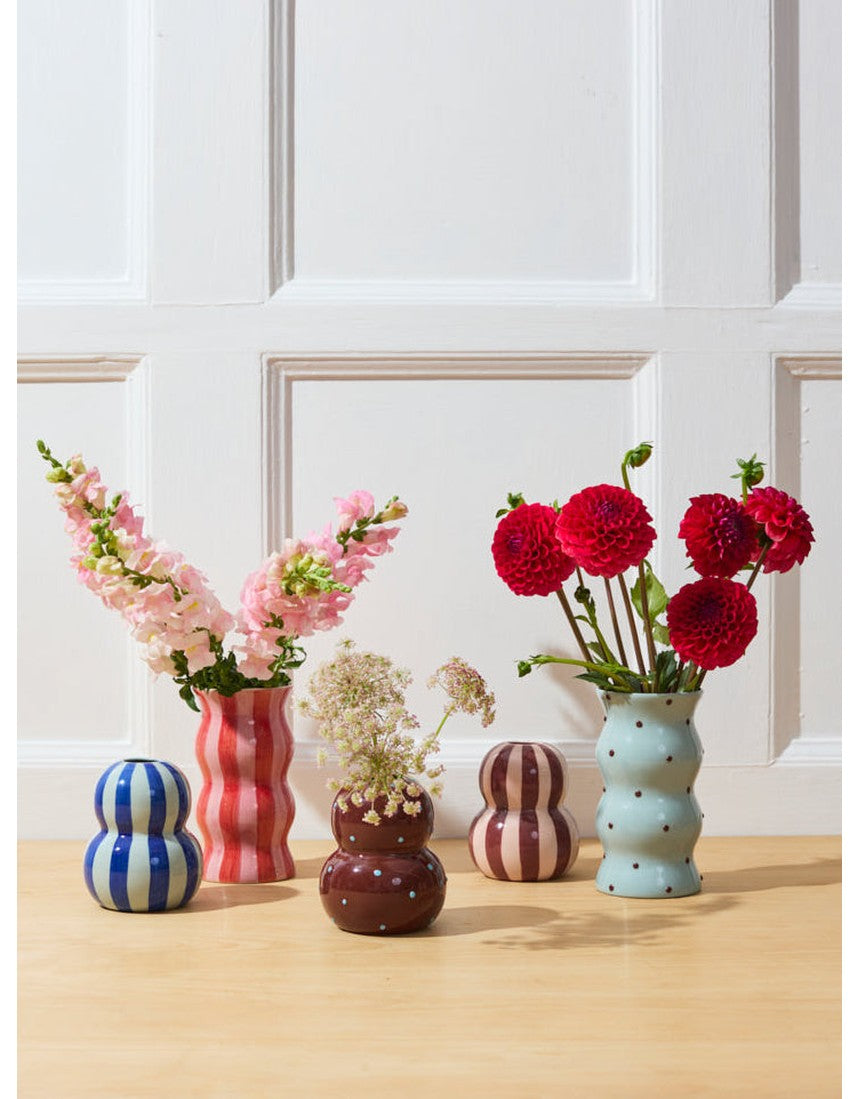 Jones & Co Palma Vase in blue and brown dotty pattern, ceramic with a sleek rounded shape and decorative design.