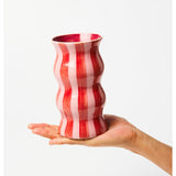 Jones & Co Palma Vase with red and pink striped ceramic design, featuring a sleek, modern shape and glossy finish.
