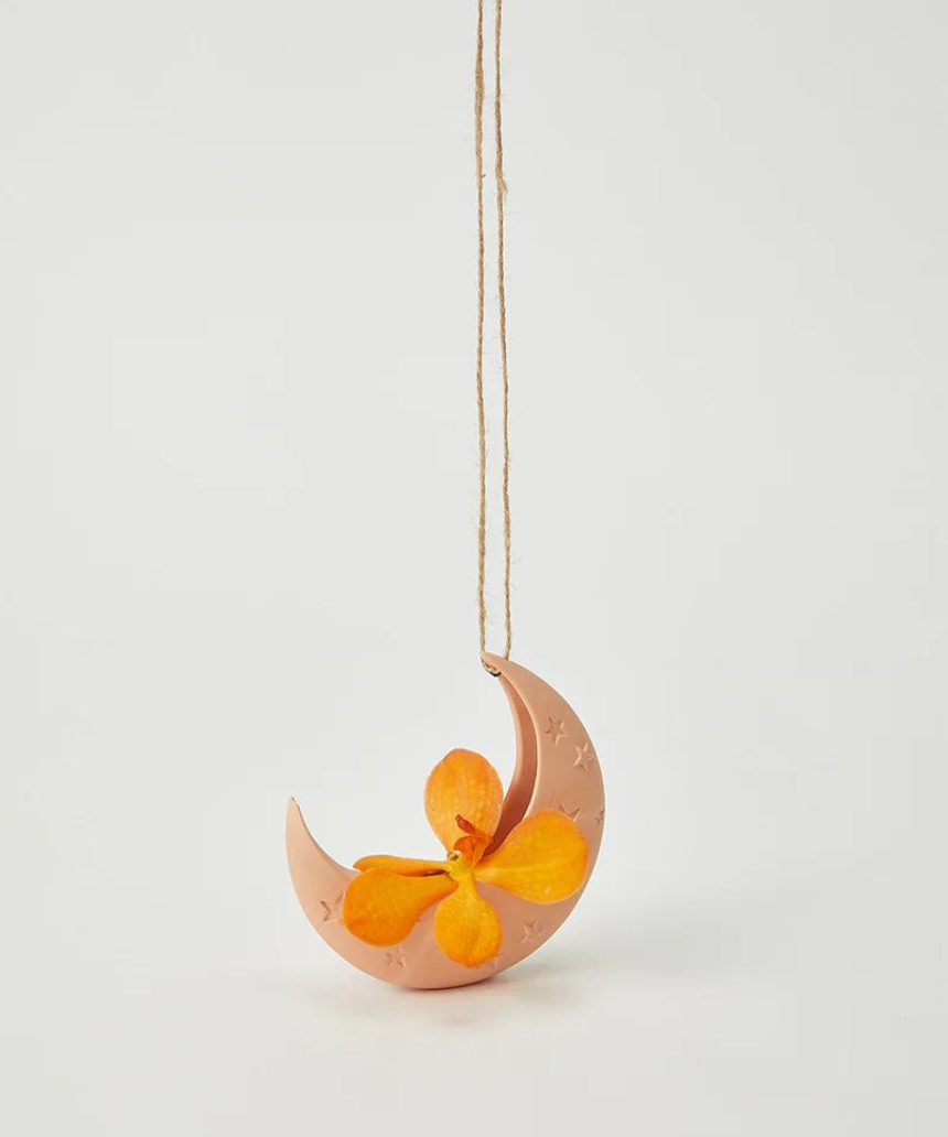 Jones & Co Luna Clay Hanging Vase with rounded design, suitable for displaying flowers or decorative arrangements.