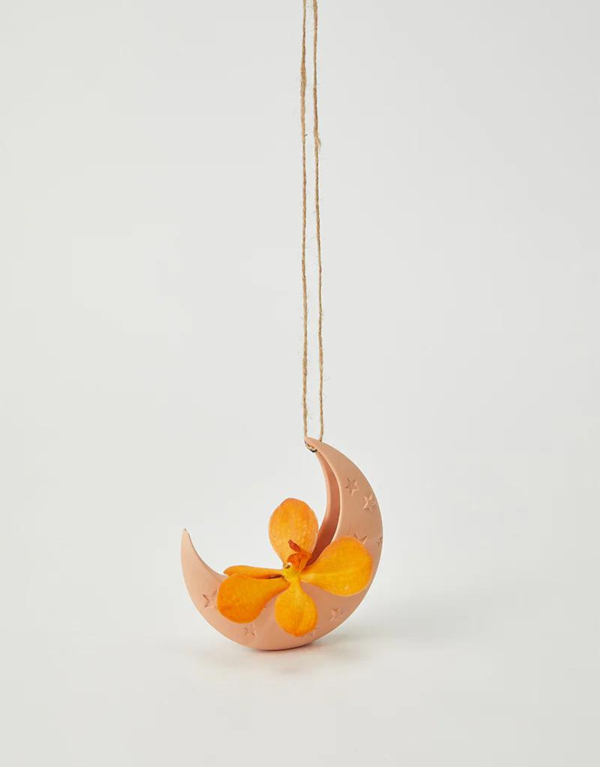 Jones & Co Luna Clay Hanging Vase with rounded design, suitable for displaying flowers or decorative arrangements.