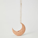 Jones & Co Luna Clay Hanging Vase showing its round, textured ceramic design with a hanging loop for wall display.