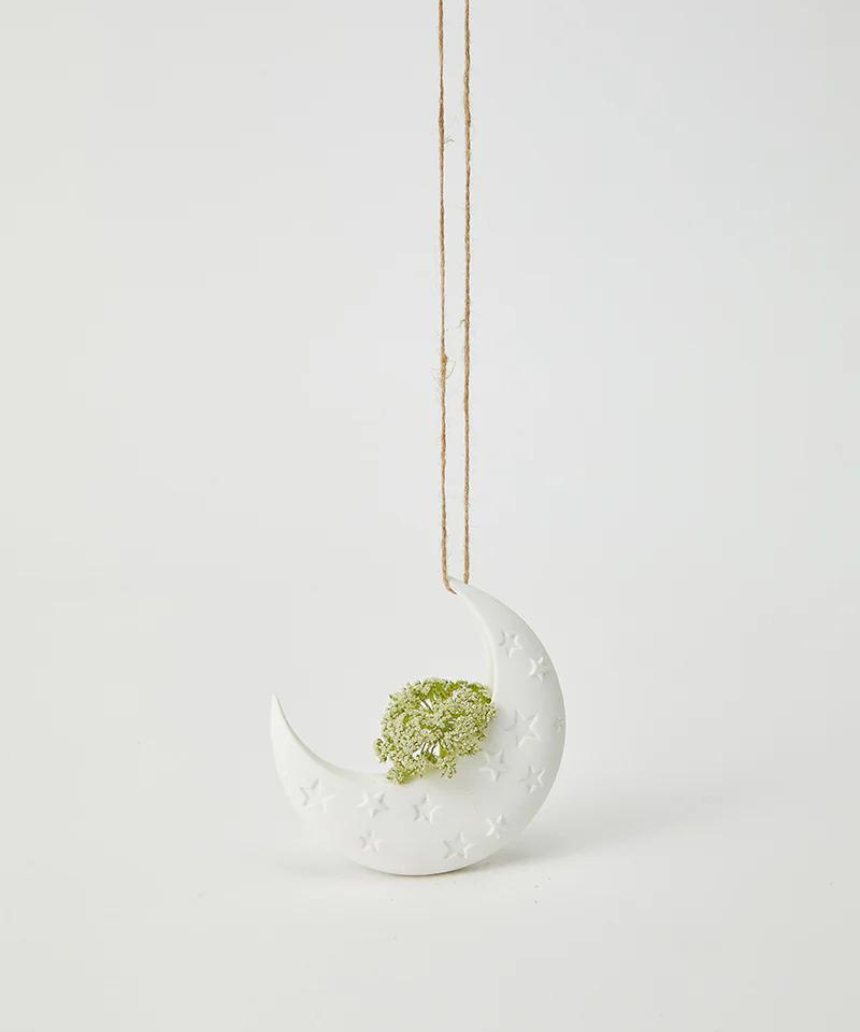 Jones & Co Luna White hanging vase with a smooth ceramic finish, designed for wall display and decorative floral arrangements.