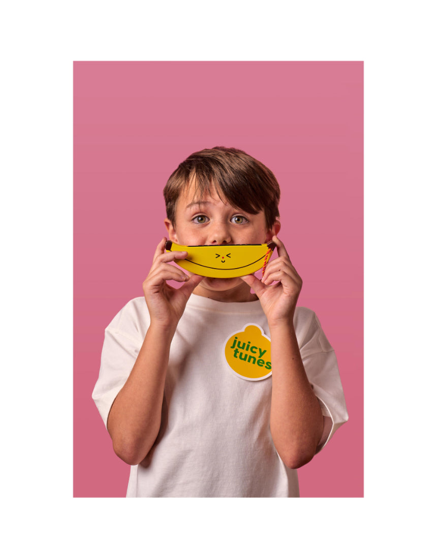 Wooden fruit harmonica by isAlbi, showing a colorful handheld musical instrument designed for children.