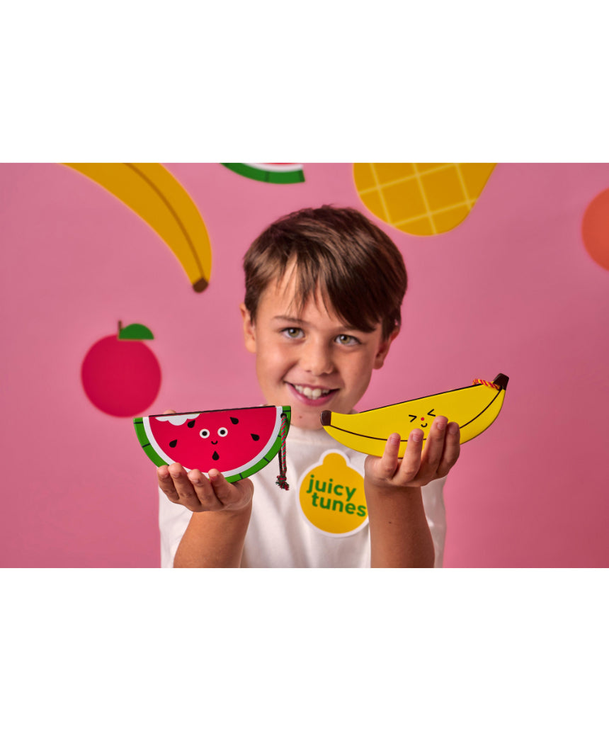 Wooden fruit harmonica by isAlbi, small colorful instrument for kids with fruit-shaped design and wooden construction.
