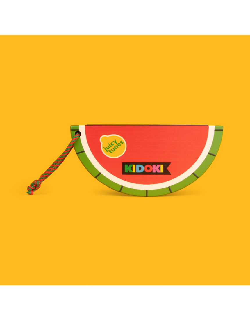Wooden fruit harmonica by isAlbi, designed for kids, showing colorful wooden keys and playful fruit-themed details.