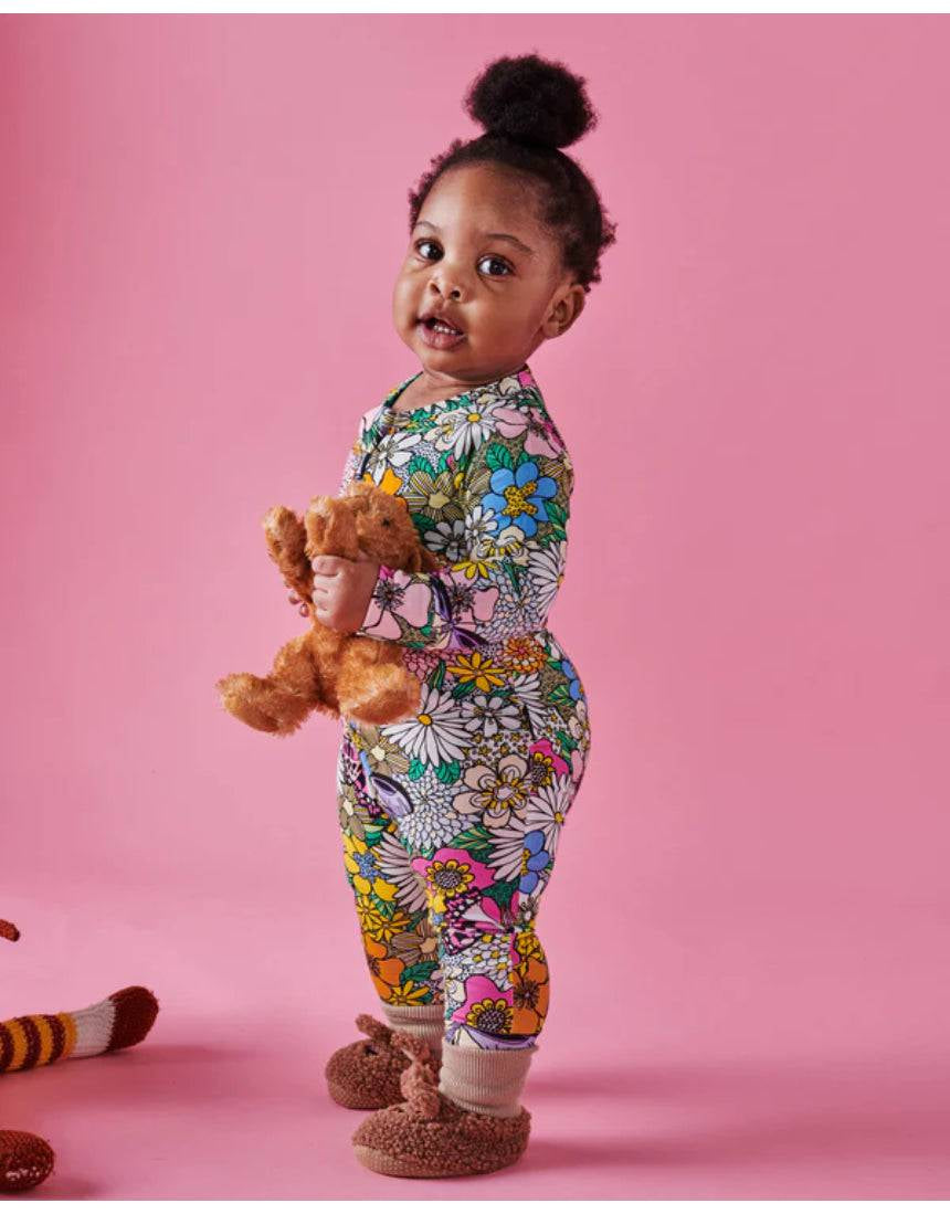Kip & Co Bliss Floral organic long sleeve zip romper for babies, featuring colorful floral pattern and soft fabric.