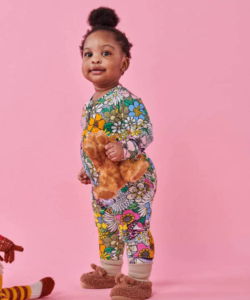 Kip & Co Bliss Floral organic long sleeve zip romper for babies, featuring colorful floral print and soft fabric.
