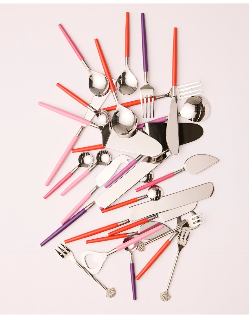 Kip&Co Cheese Knife Set Diner Radiance with four stainless steel knives featuring colorful handles for cheese serving.