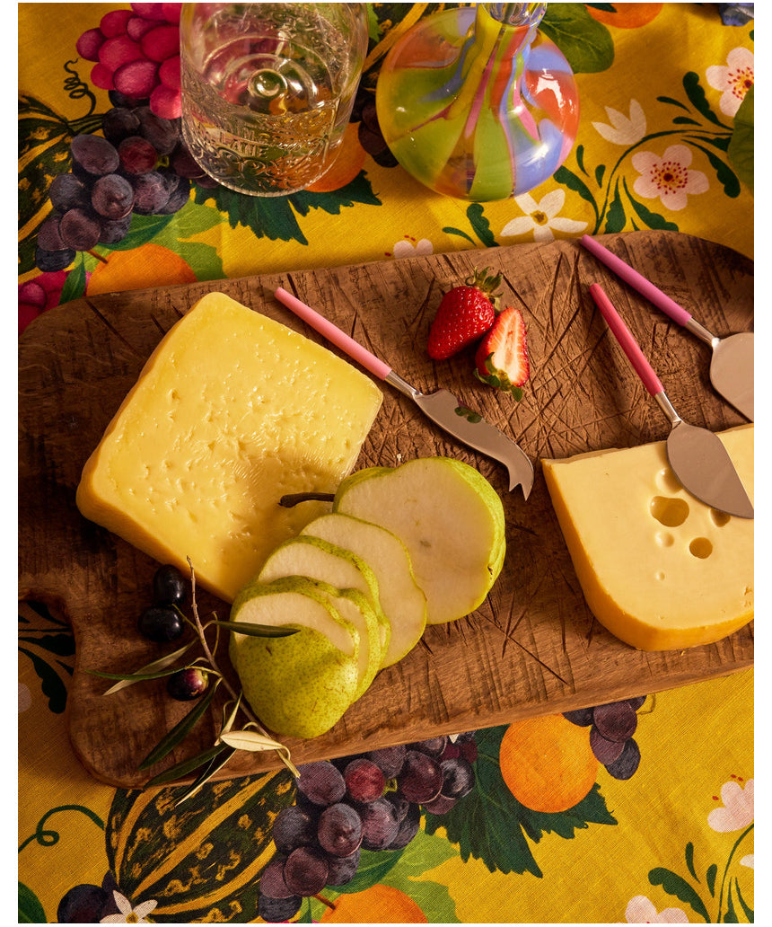 Kip & Co Diner Radiance cheese knife set with three stainless steel cutlery pieces on a wooden surface.