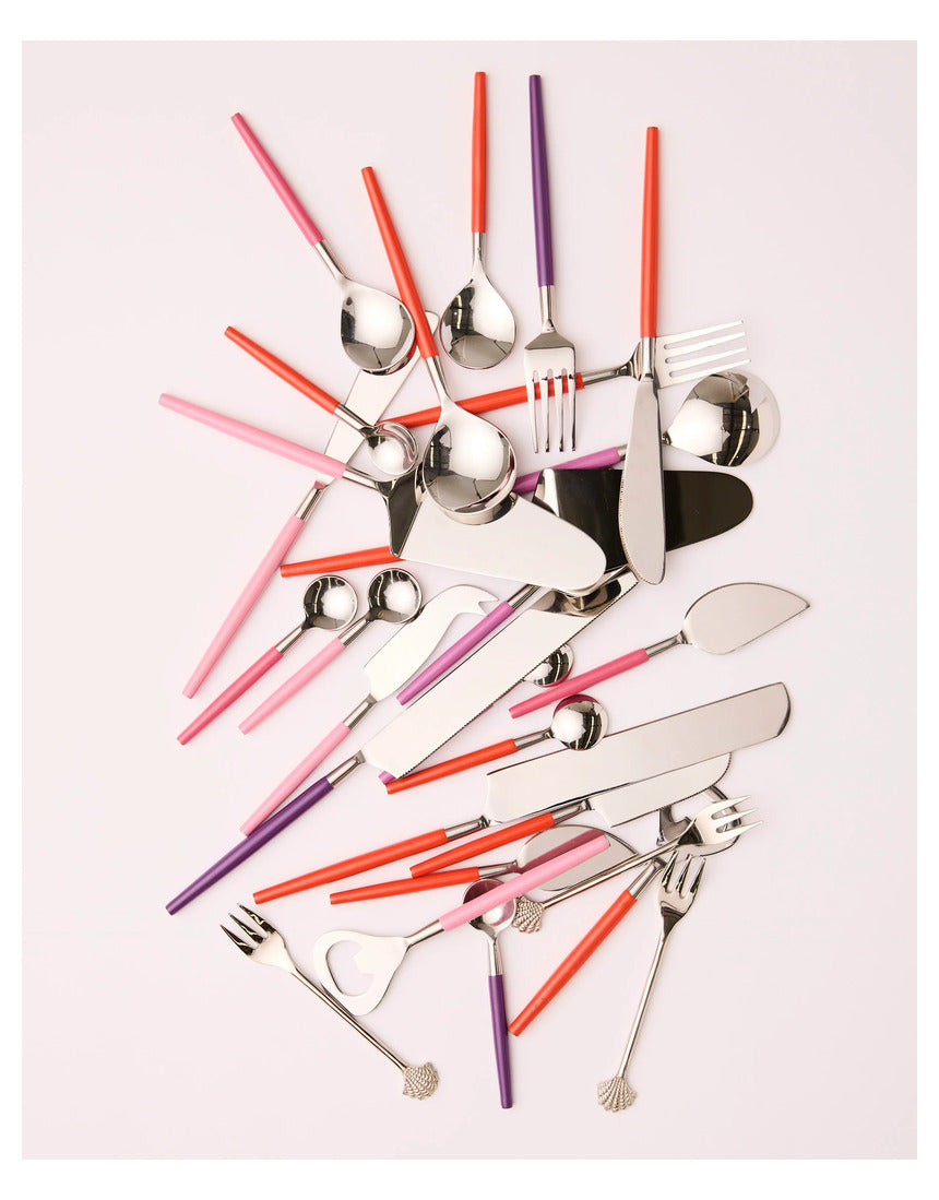Kip & Co Diner Radiance cutlery set featuring sleek knives and spoons with a modern, colorful design.