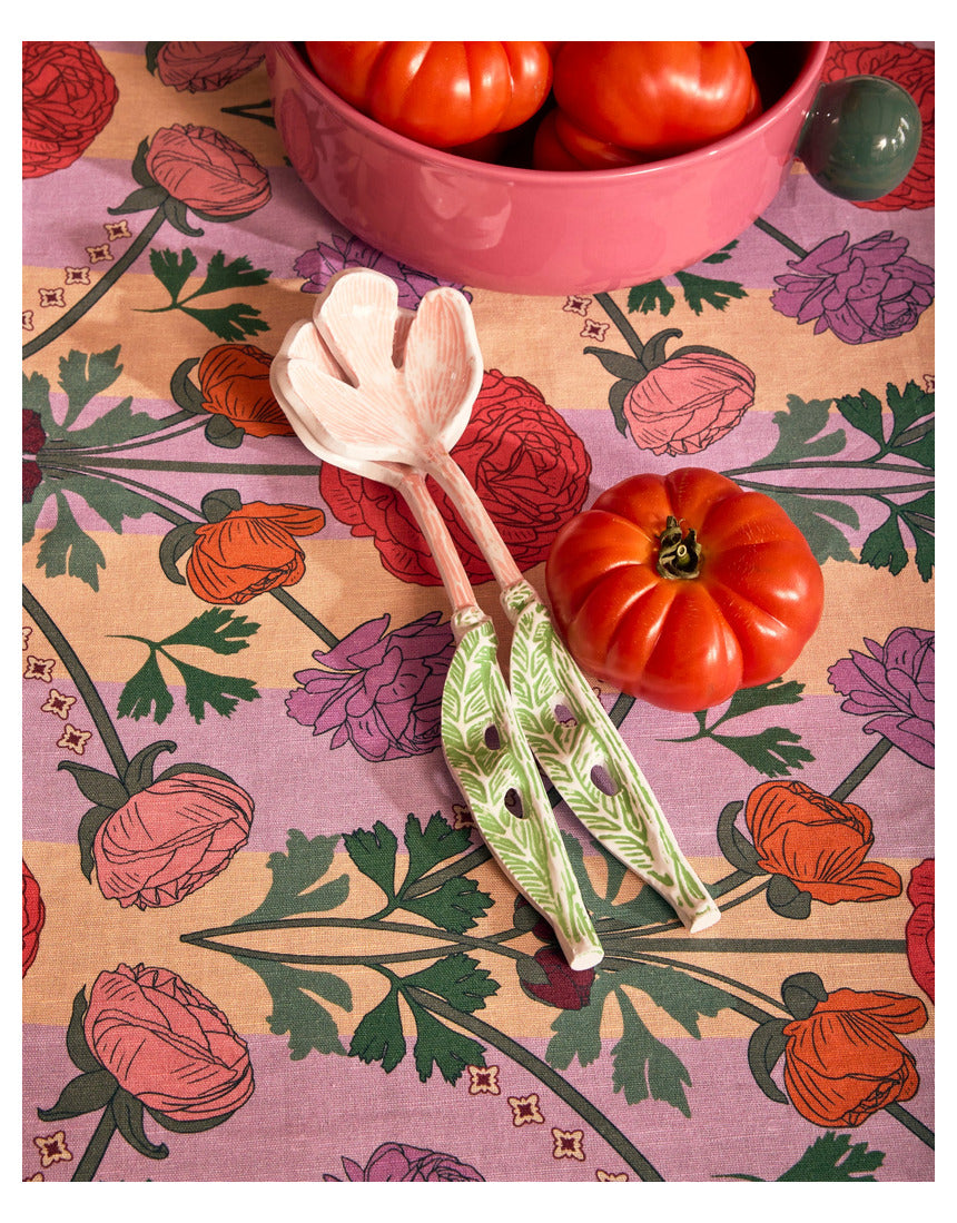 Kip & Co floral salad servers set with colorful floral-patterned cutlery for serving salads in a vibrant, decorative style.