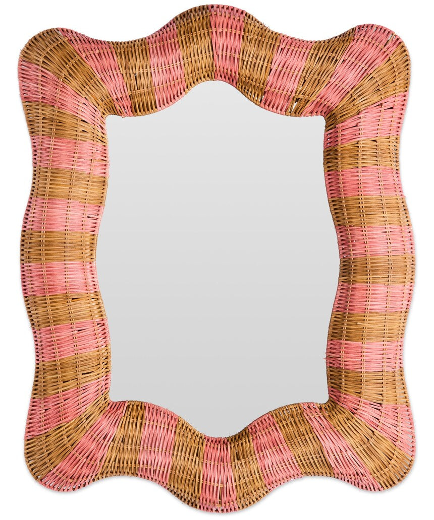 Kip & Co Guava Stripe Rattan Wall Mirror with round shape and woven rattan frame, hanging on a wall.