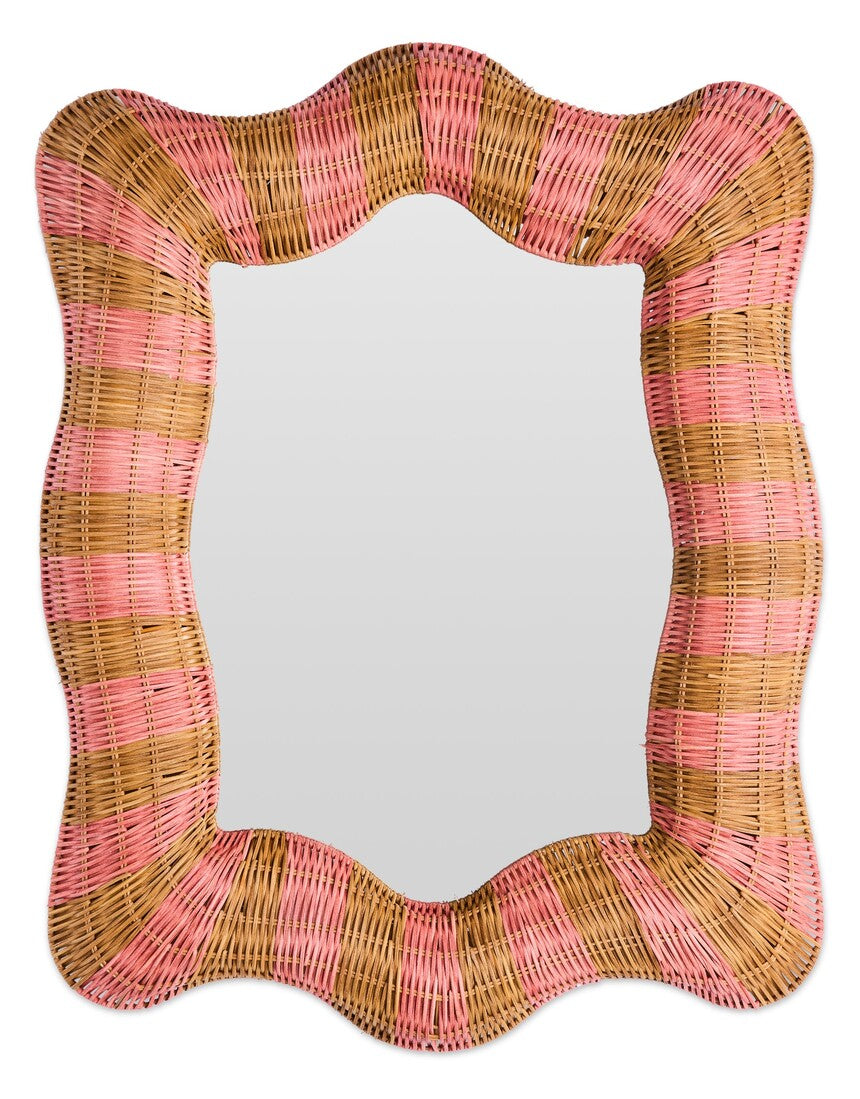Kip & Co Guava Stripe Rattan Wall Mirror with round shape and woven rattan frame, hanging on a wall.