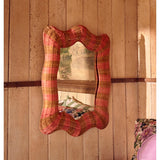 Kip & Co Guava Stripe Rattan Wall Mirror with a round rattan frame and vibrant striped design for stylish home decor.