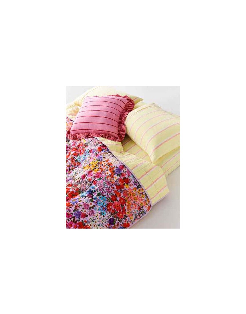Kip & Co Iced Vovo Stripe Frill Upholstery Cushion with colorful striped fabric and decorative frill detail.