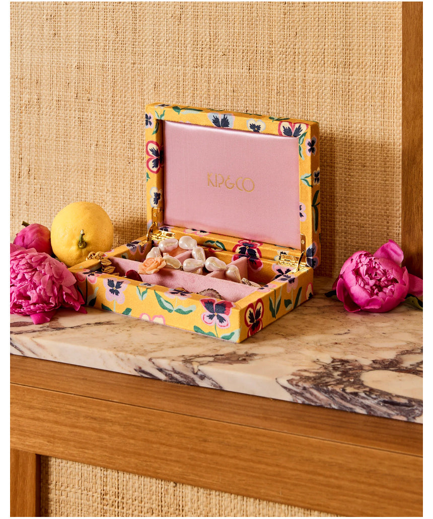 Small Kip & Co Pretty Pansy velvet jewellery box with floral design and soft interior for storing rings and necklaces.