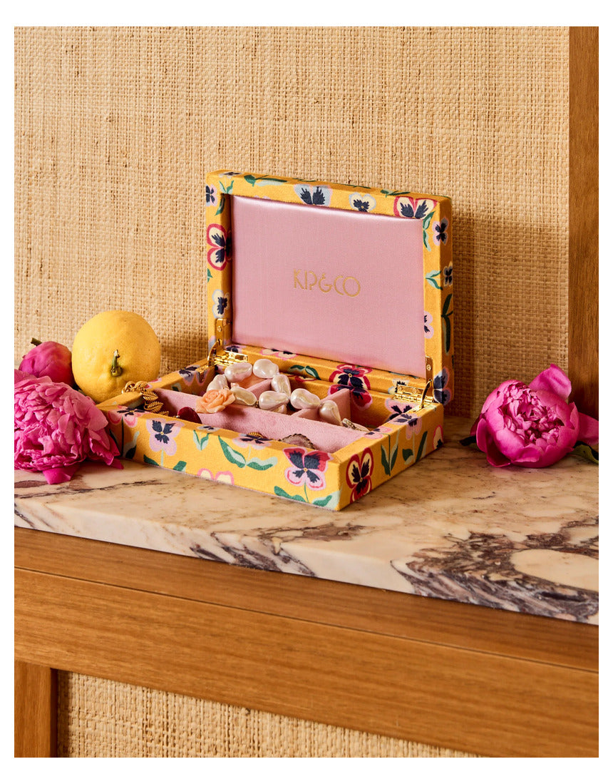 Small Kip & Co Pretty Pansy velvet jewellery box with floral design and soft interior for storing rings and necklaces.