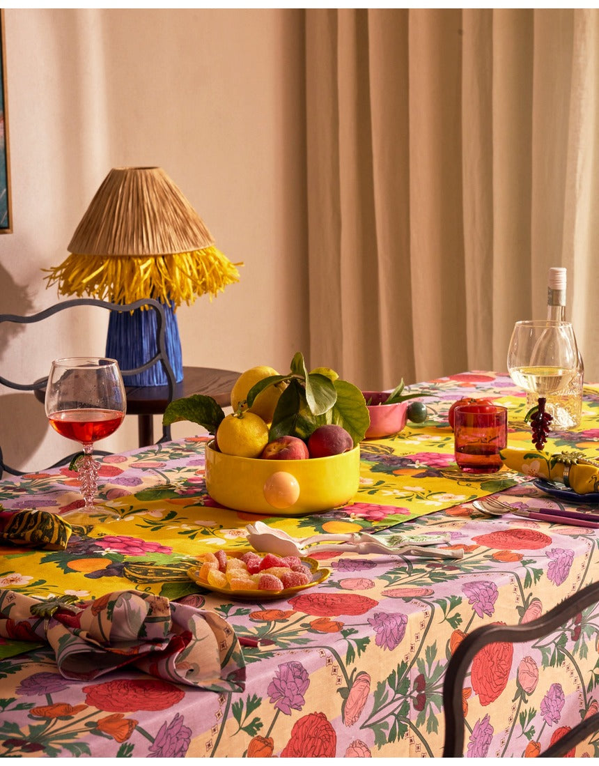 Kip&Co floral salad servers set with colorful floral design, featuring fork and spoon for serving salads in a vibrant style.
