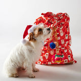 Red velvet Santa sack by Kip & Co with "HoHoHo" design, perfect for Christmas gift wrapping and holiday decor.