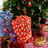 Kip & Co red velvet Santa Sack with white "HoHoHo" lettering for Christmas gift packaging and holiday decor.
