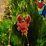 Kip & Co Lobster Christmas Decoration featuring a colorful lobster design, perfect for holiday decor.