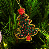 Kip & Co Christmas Tree decoration featuring a festive, colorful ornament with holiday patterns and a hanging string.
