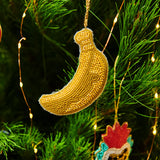 Kip & Co Banana Christmas Decoration with colorful design, hanging ornament for festive holiday decor.