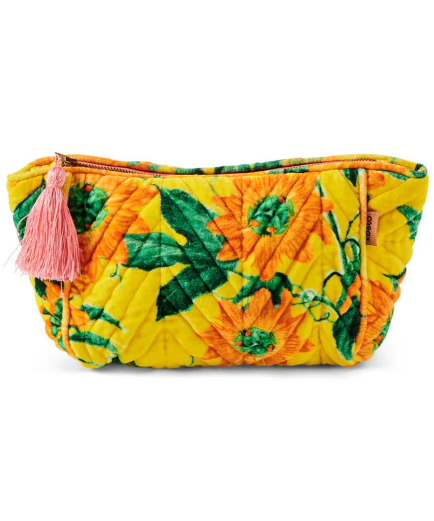 Kip & Co Passiona Velvet Toiletry Bag in vibrant floral print, soft velvet material, with zipper closure and compact accessory design.
